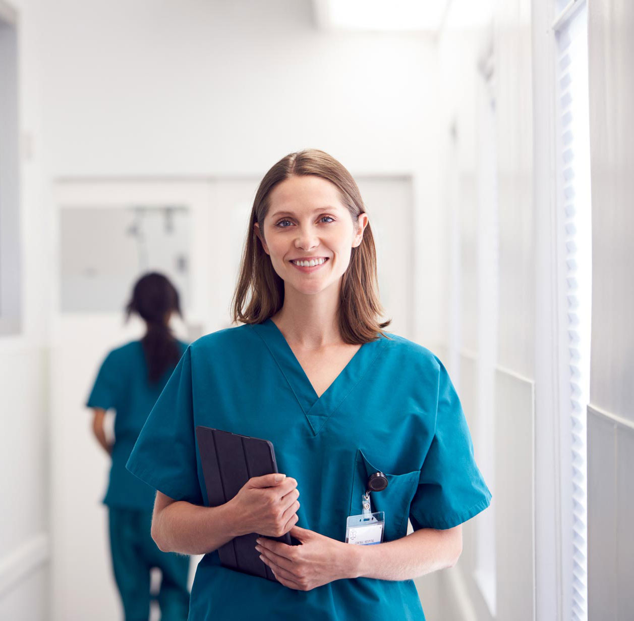 portrait-of-smiling-female-doctor-wearing-scrubs-HZ79GZQ-1.jpg portrait-of-smiling-female-doctor-wearing-scrubs-HZ79GZQ-1.jpg